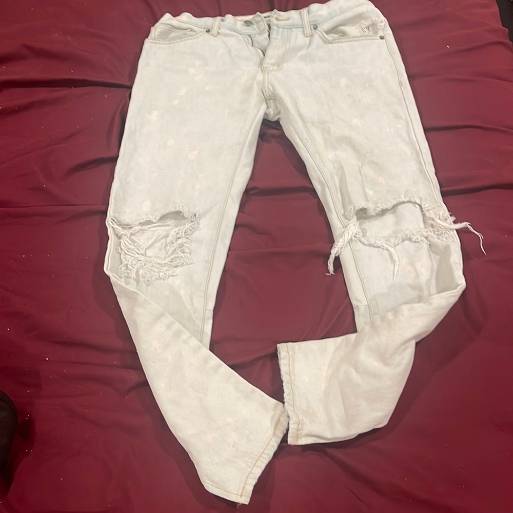 Distressed Skinny Light blue Acid wash jeans with zipper hem size 32